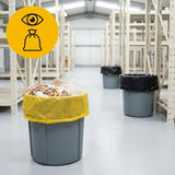 Gele afvalzakken van 60 liter in afvalbakken